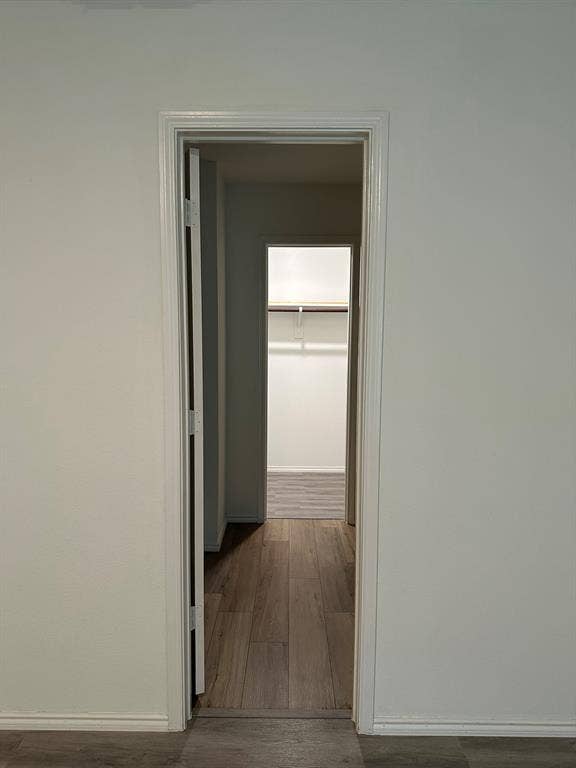 5705 Manarchos Lane, Forney, TX 75126 Corridor with wood finished floors and baseboards