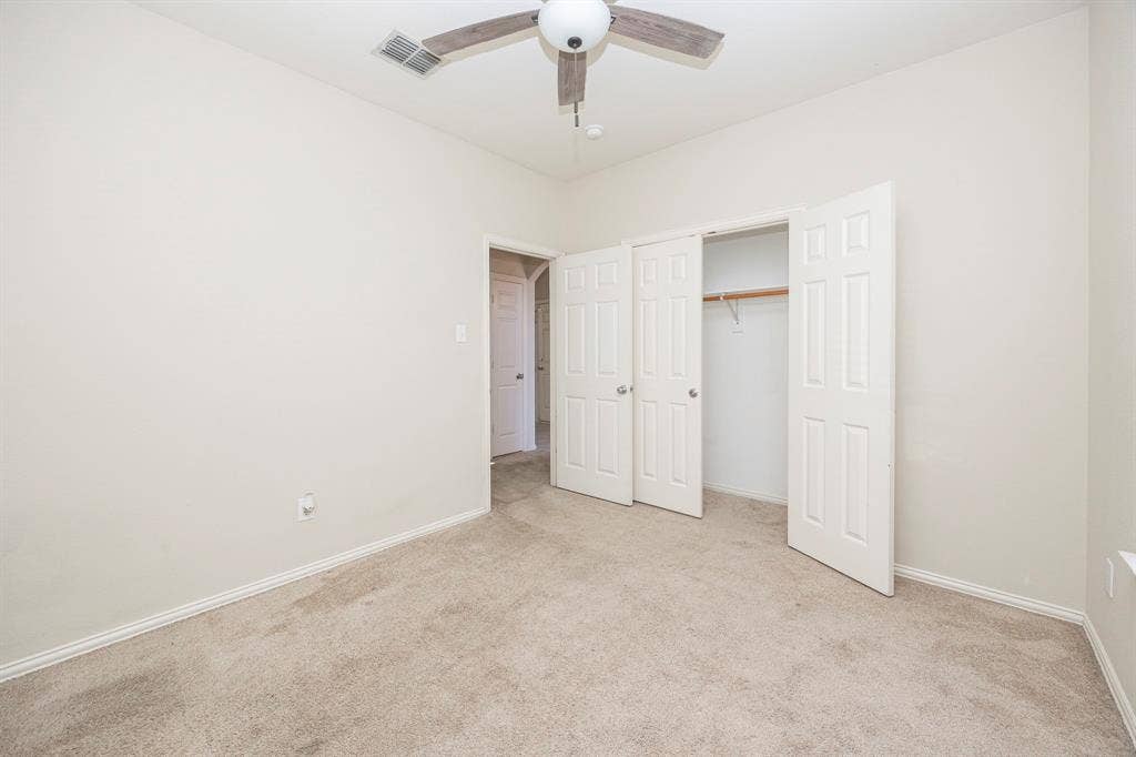 5728 Calloway Drive, McKinney, TX 75070 Neutral-toned carpeting throughout