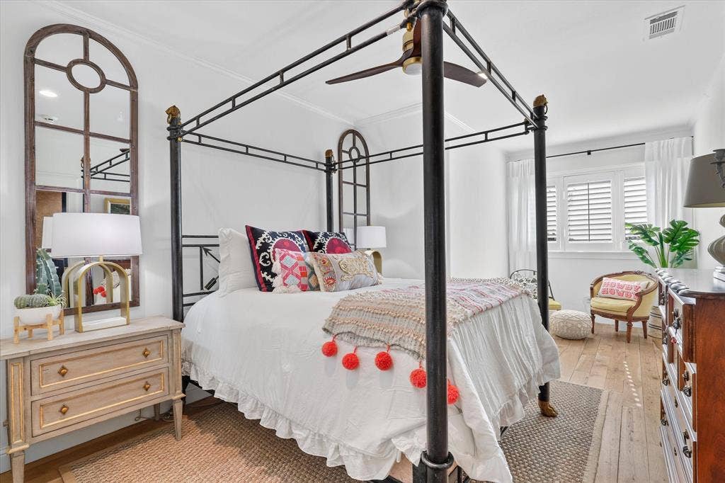 5 SAVANNAH Circle, Frisco, TX 75034 Light-filled secondary bedroom combines generous proportions with distinctive architectural character.