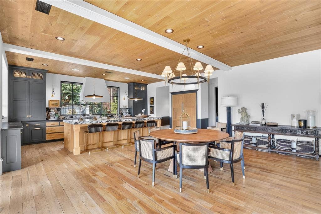 5 SAVANNAH Circle, Frisco, TX 75034 Generously scaled dining area flows effortlessly between the kitchen and family room.