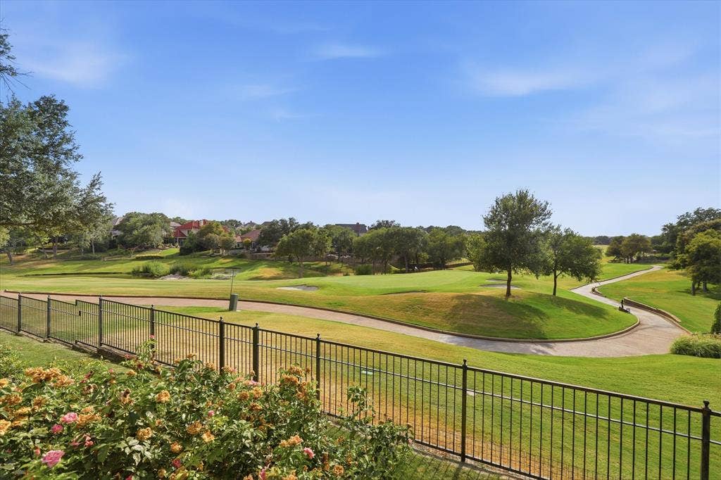 5 SAVANNAH Circle, Frisco, TX 75034 Sweeping golf course views create an exceptional backdrop for the home and outdoor living spaces.