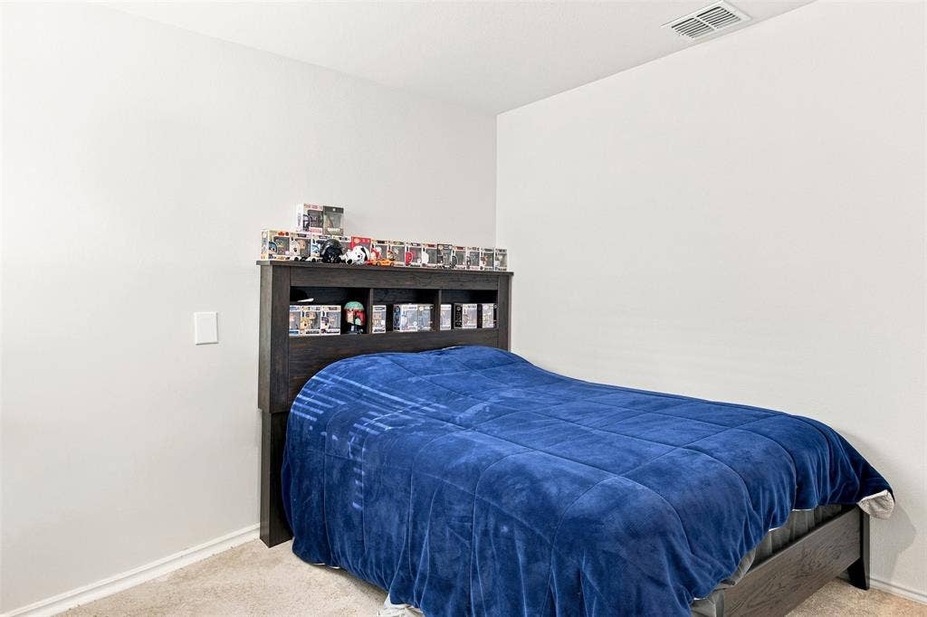 3409 Flicker Lane, McKinney, TX 75071 Neutral wall color, carpet flooring, and white trim