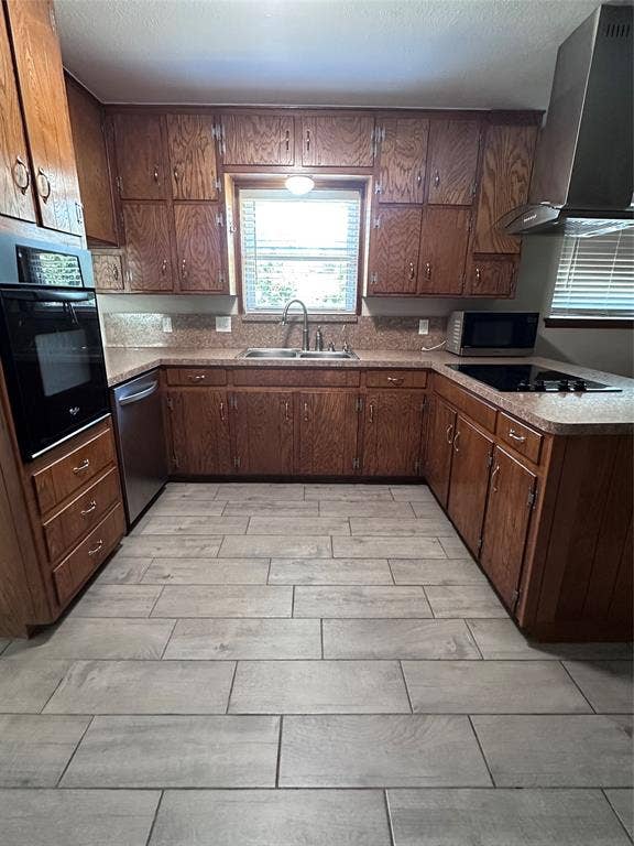 1321 Hurstview Drive, Hurst, TX 76053 Wood-finish cabinetry, built-in oven, stainless steel dishwasher, kitchen sink with a gooseneck faucet, and light-toned tile flooring