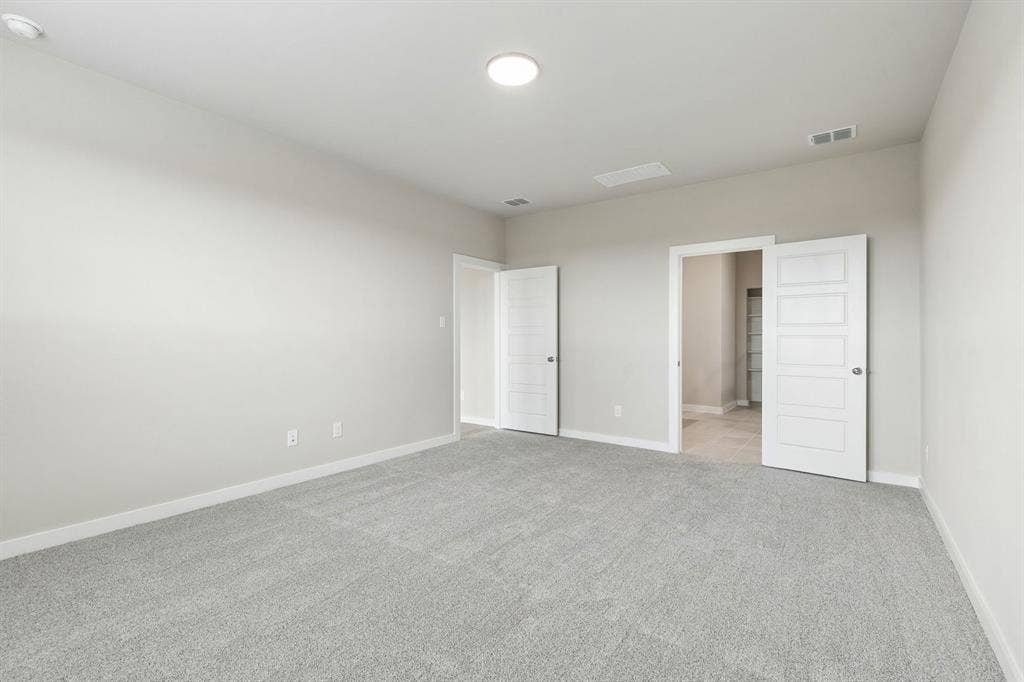Primary Suite in the Winters home plan by Trophy Signature Homes – REPRESENTATIVE PHOTO