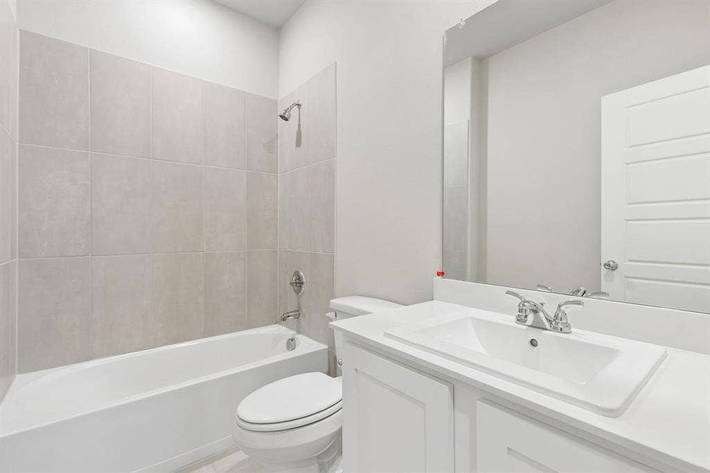 15105 Ram Rock Drive, Aledo, TX 76008 Bathroom in the Winters home plan by Trophy Signature Homes – REPRESENTATIVE PHOTO