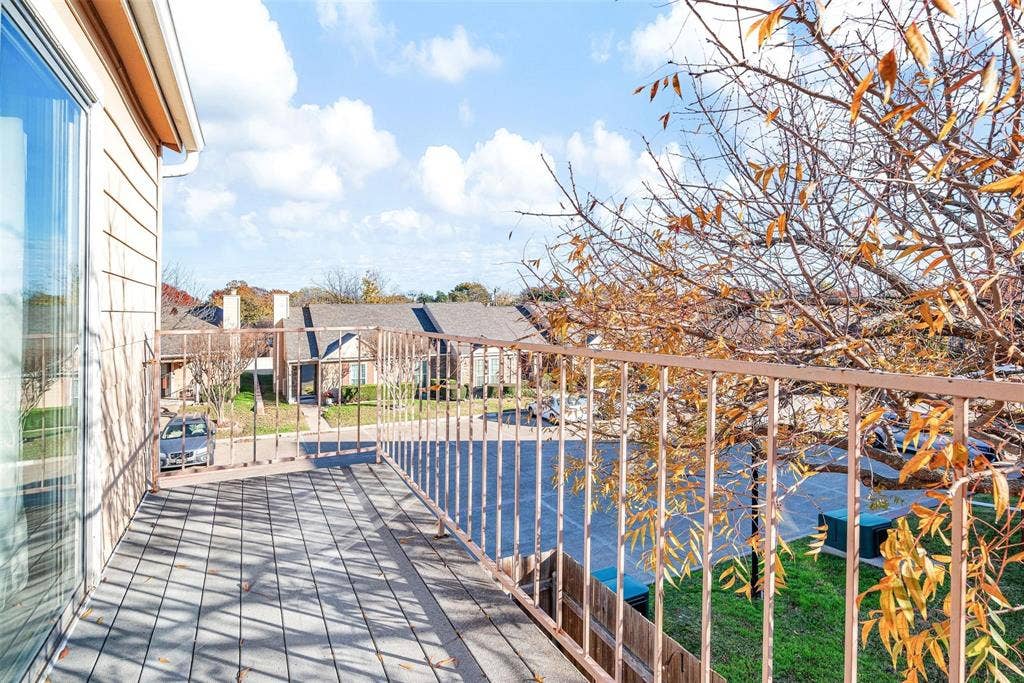 2500 E Park Boulevard, #P2, Plano, TX 75074 Balcony overlooking the parking lot and grass area
