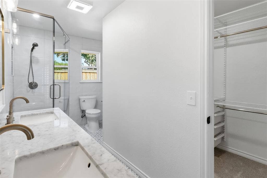 2808 Fountain Head Drive, Plano, TX 75023 Dual vanity with integrated sinks and quartz countertop