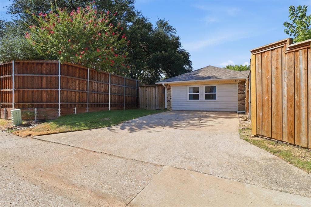 2808 Fountain Head Drive, Plano, TX 75023 Enclosed garage but still plenty of space to park cars.