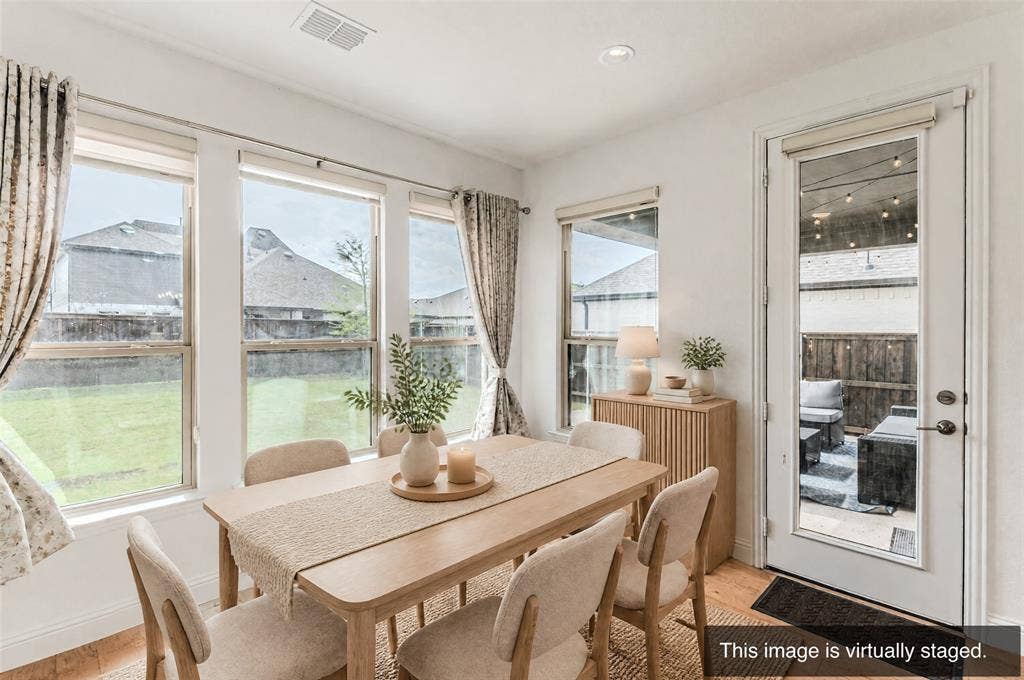 2515 Bedford Road, Northlake, TX 76226 Recessed lighting, wood-finish flooring, multiple windows, full-light door, and a private outdoor patio area