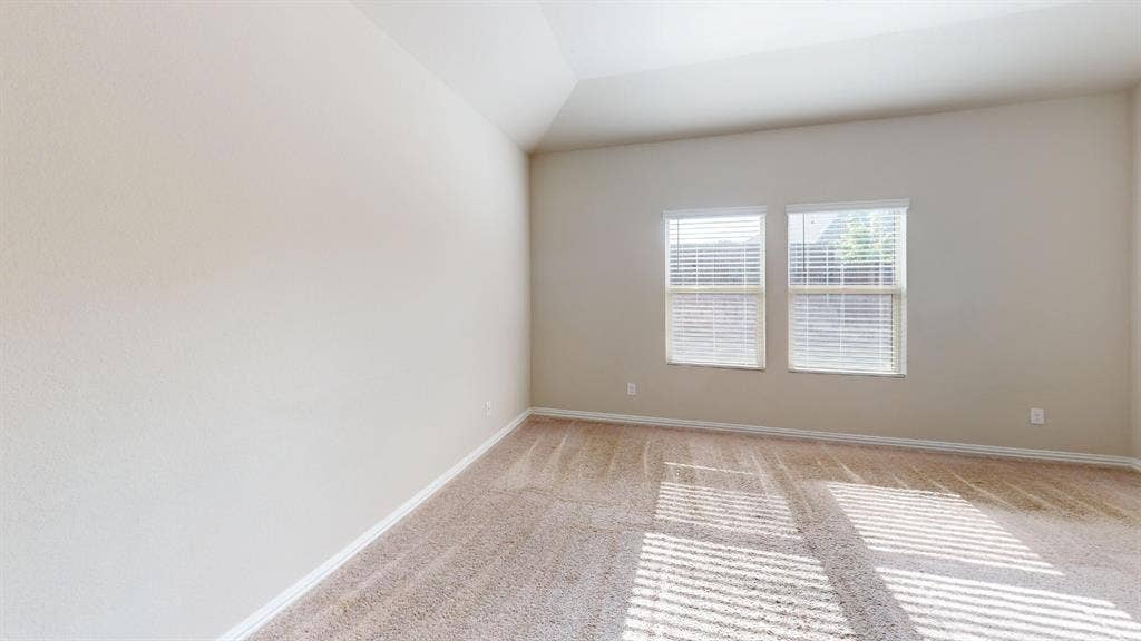 1508 Lannon Lane, Melissa, TX 75454 Vaulted ceiling, neutral wall paint, two windows with horizontal blinds, and carpeted flooring