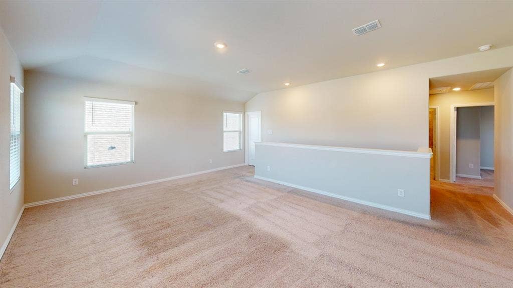 1508 Lannon Lane, Melissa, TX 75454 Spacious room featuring carpet flooring, recessed lighting, multiple windows with blinds, and a partial wall