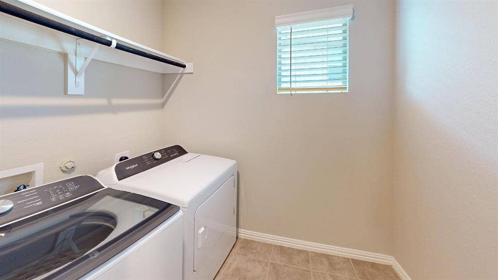 1508 Lannon Lane, Melissa, TX 75454 Tile flooring, built-in shelving, mounted clothes rod, window with blinds
