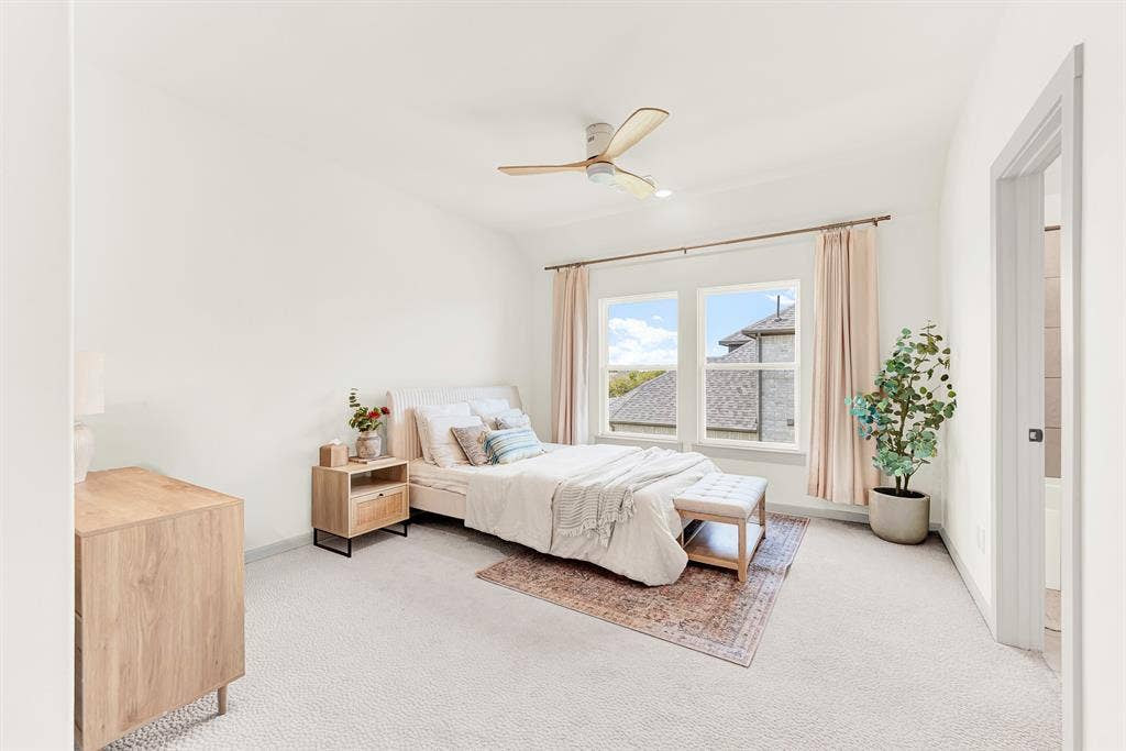 10067 Clover Forest Court, Frisco, TX 75035 A tall framed doorway opens smoothly into a spacious, light-filled sleeping sanctuary. Teenagers or overnight visitors can enjoy peaceful late-night relaxation with plenty of room to stretch out
