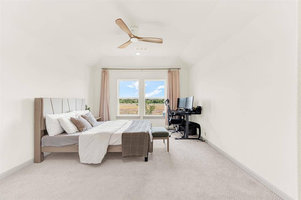 10067 Clover Forest Court, Frisco, TX 75035 Slightly sloped ceilings and framed double windows direct natural light straight across the deep room layout. It offers an easy space to focus on homework or dive into a favorite book during quiet afternoon hours.