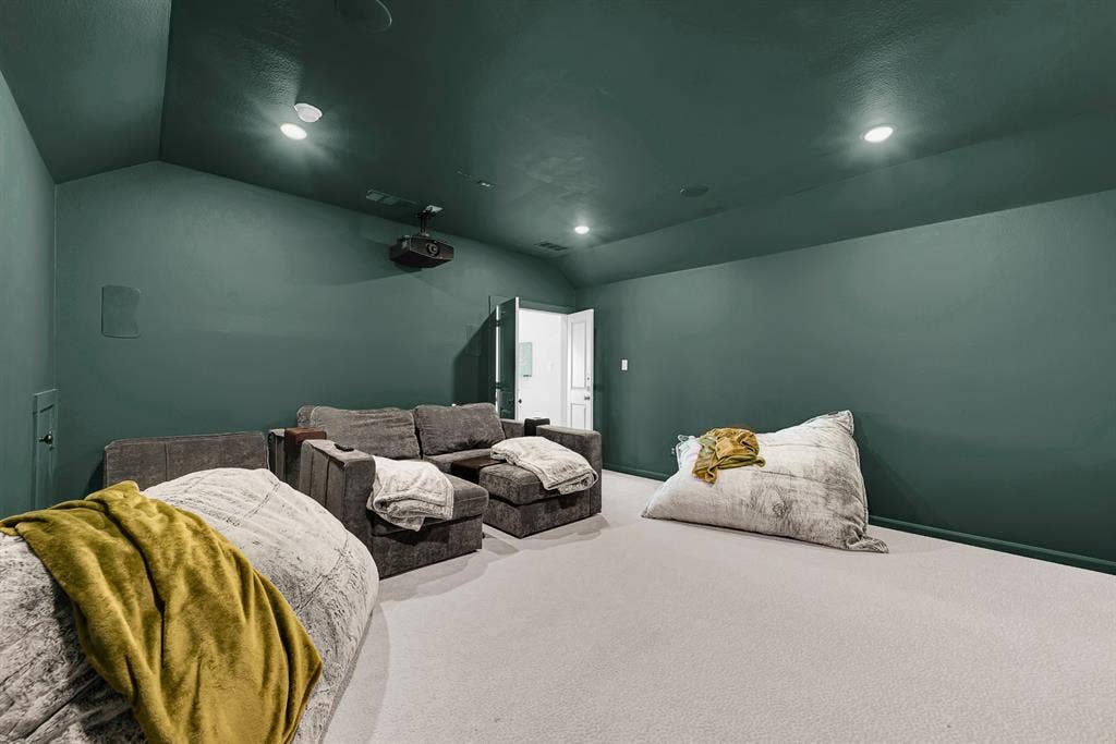 10067 Clover Forest Court, Frisco, TX 75035 Enclosed dark surfaces and subtle recessed fixtures craft an intimate, cocoon-like atmosphere. It’s tailor-made for hosting game-day watch parties where everyone gets lost in the big-screen action.