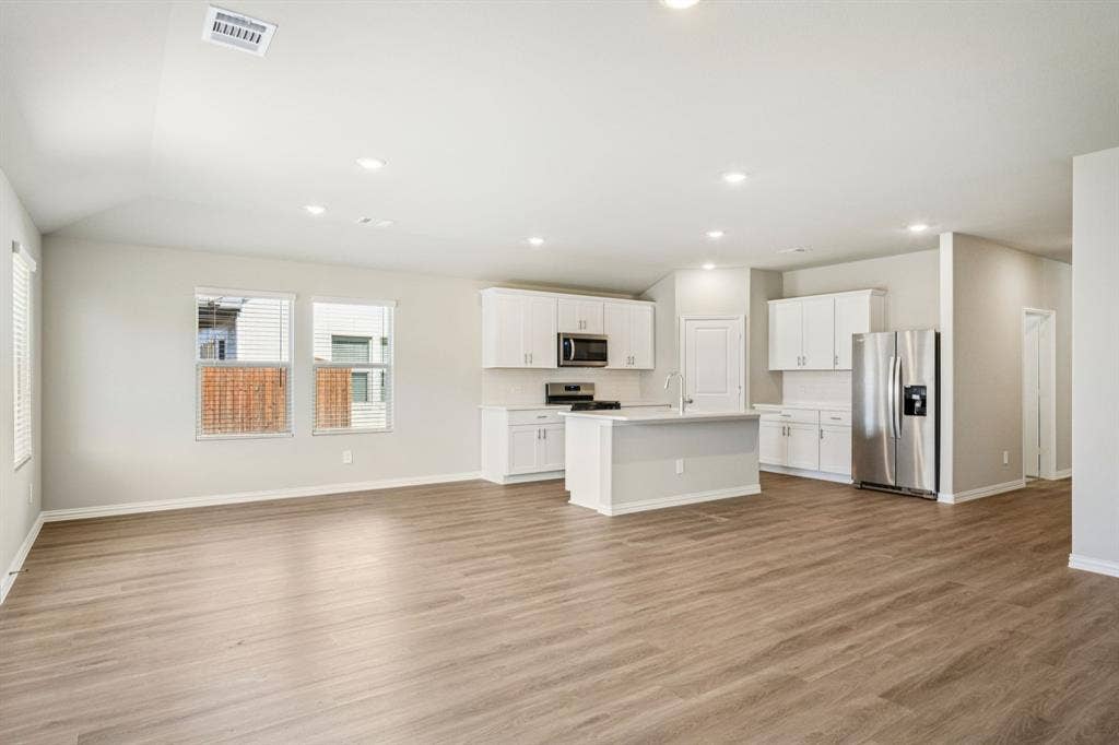 2125 Longchamp Lane, Seagoville, TX 75159 Photo is not of the actual home, but is an inspirational photo of builder’s model home and may depict options, furnishings, and/or decorator features that are not included.