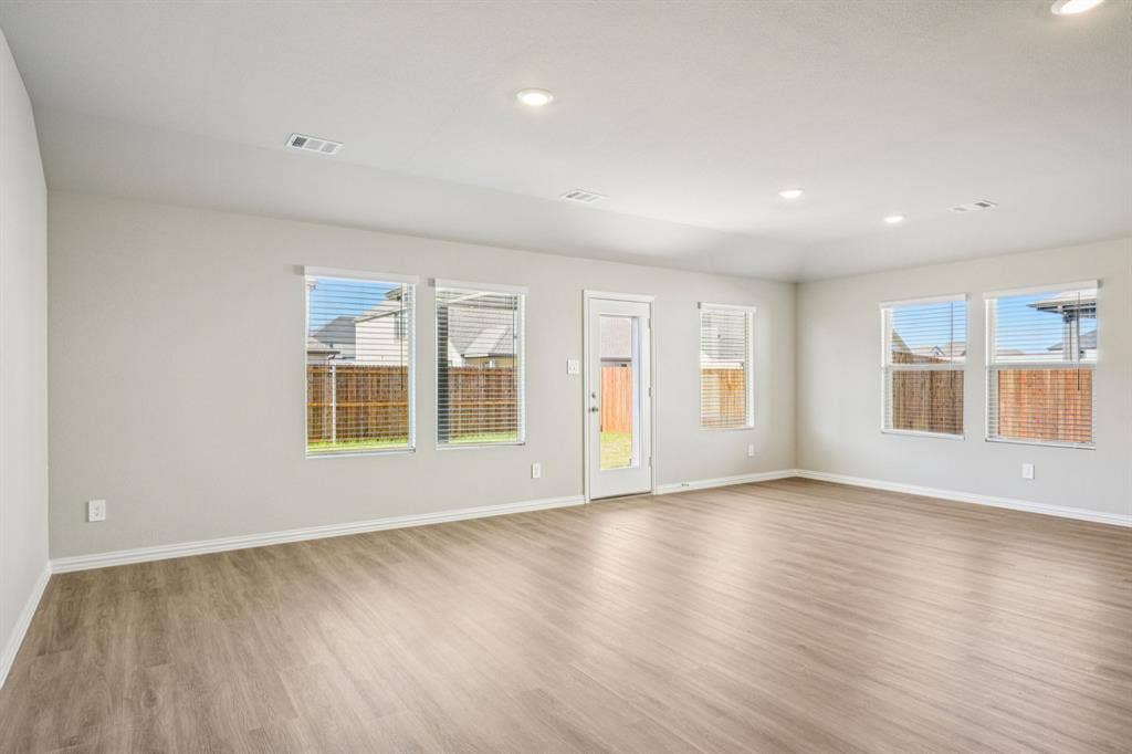 2125 Longchamp Lane, Seagoville, TX 75159 Photo is not of the actual home, but is an inspirational photo of builder’s model home and may depict options, furnishings, and/or decorator features that are not included.