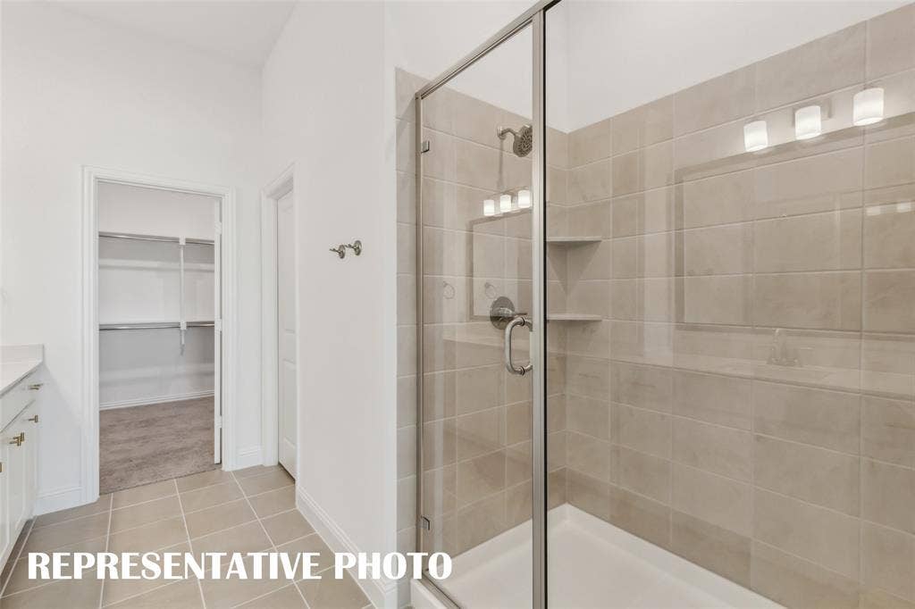 1032 Splitrock Drive, Allen, TX 75013 Featuring an oversized walk in shower, you'll never want to leave this beautiful owner's bath!