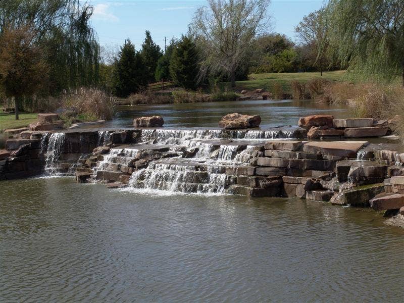 929 Oakland Hills Drive, Fairview, TX 75069 This pond is at the front entry near 24 guard gate