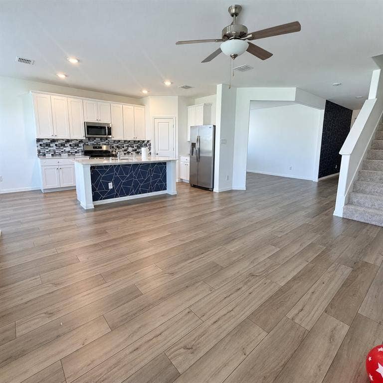 8432 Butterfly Lane, McKinney, TX 75071 Wood-finish flooring throughout the main level