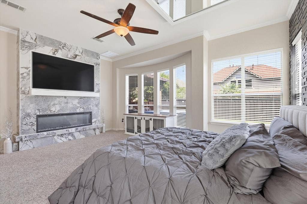 Beautiful electric fireplace and framed TV that Stays