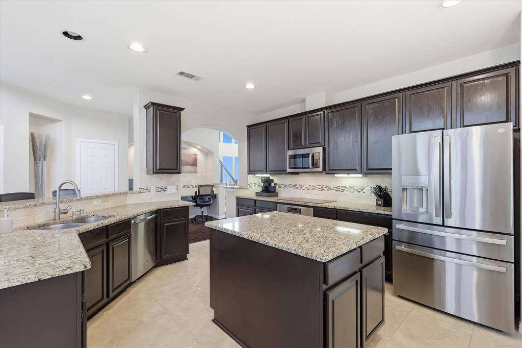 Kitchen offers plenty of storage and prep space