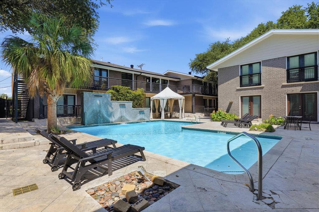 10207 Regal Oaks Drive, #109, Dallas, TX 75230 One of three community pools available to residents; this is the pool located closest to the condo.