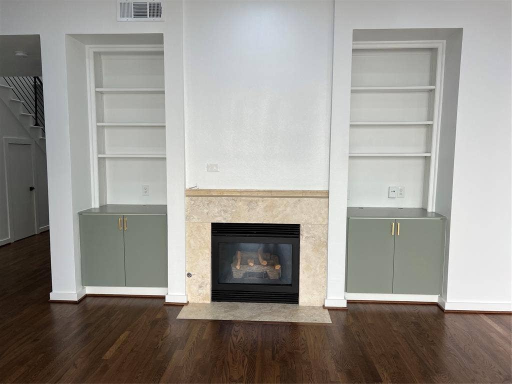 4304 Gilbert Avenue, Dallas, TX 75219 Built ins and fireplace