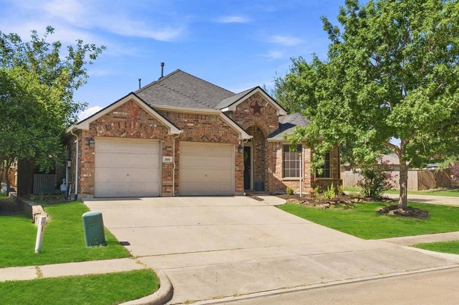 Property photo for 319 Sugarberry Lane, Fate, TX