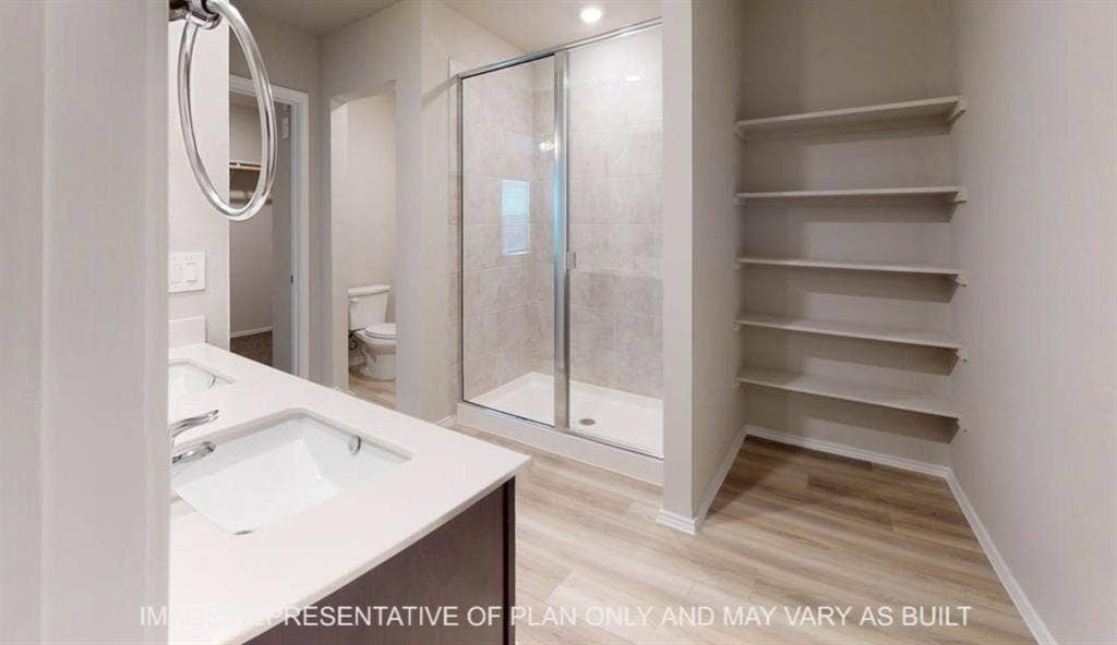3112 Cyprian Road, Lorena, TX 76655 Modern primary bathroom featuring a floating vanity with rectangular vessel sink, quartz countertop, and chrome faucet