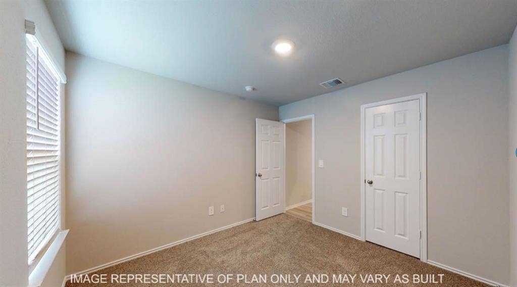 3112 Cyprian Road, Lorena, TX 76655 Neutral wall color, recessed lighting, window with blinds, paneled interior doors, and carpet flooring