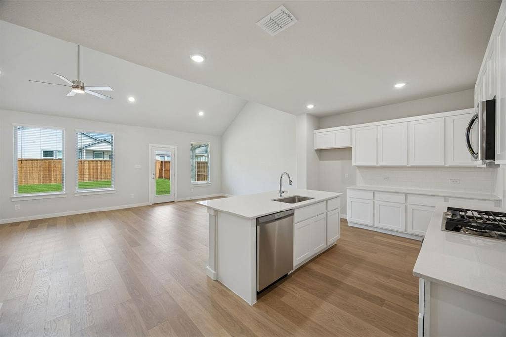 1324 Companero Street, Haslet, TX 76052 Open Floor Plan in the Masters home plan by Trophy Signature Homes – REPRESENTATIVE PHOTO