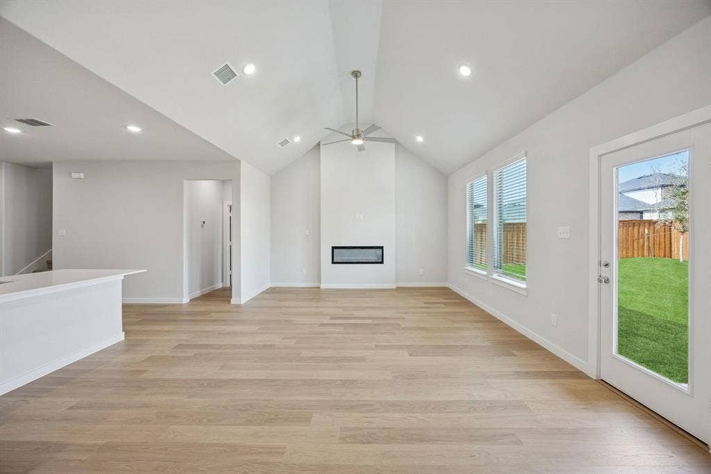 1324 Companero Street, Haslet, TX 76052 Living Room in the Masters home plan by Trophy Signature Homes – REPRESENTATIVE PHOTO