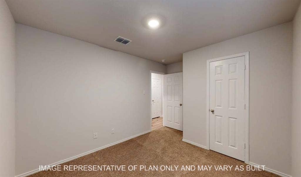 10428 Neptune Court, Waco, TX 76708 Neutral wall finishes, carpet flooring, recessed lighting, and panel doors