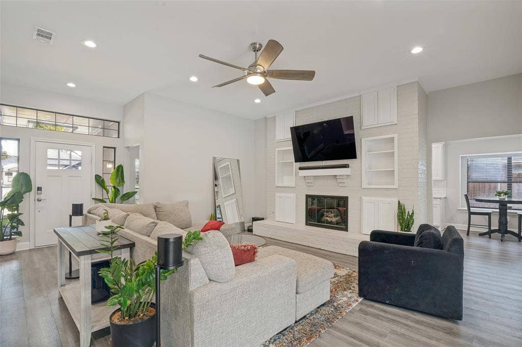 3313 Darion Lane, Plano, TX 75093 Upon entering, you have your living room with fireplace and coziness