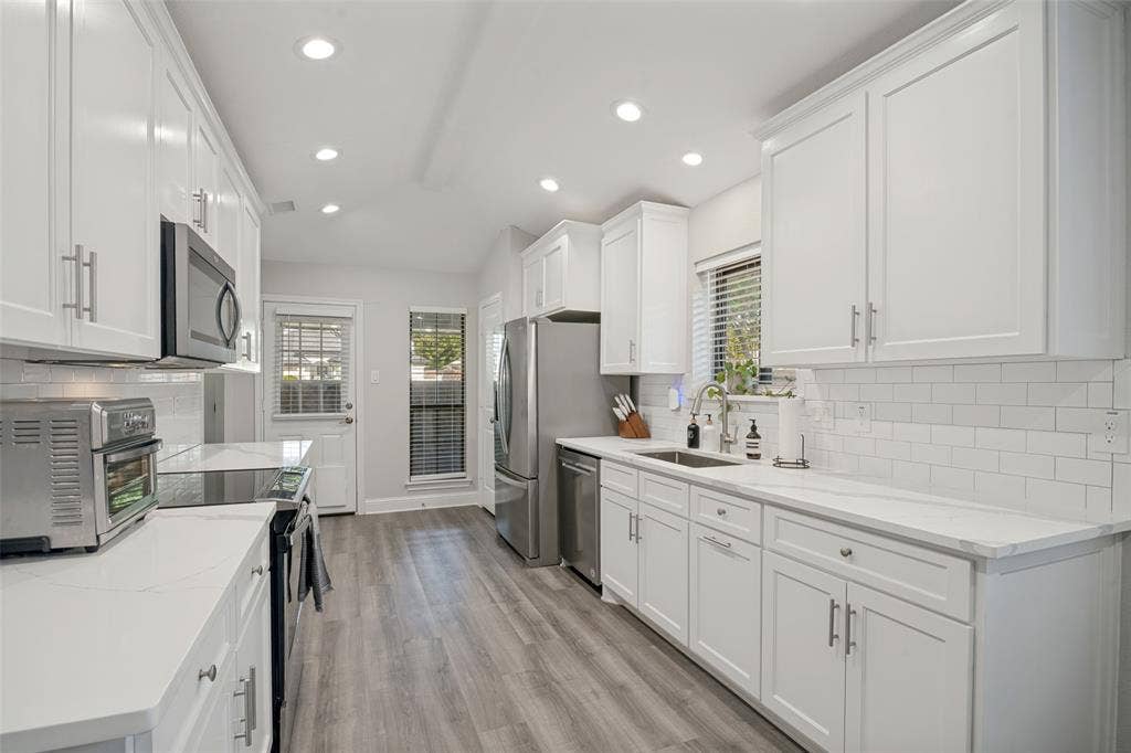 3313 Darion Lane, Plano, TX 75093 Kitchen with stainless steel appliances
