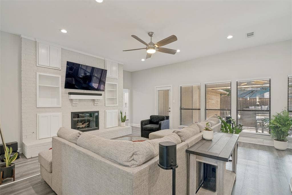 3313 Darion Lane, Plano, TX 75093 Living room also has view of the pool and door to get outside