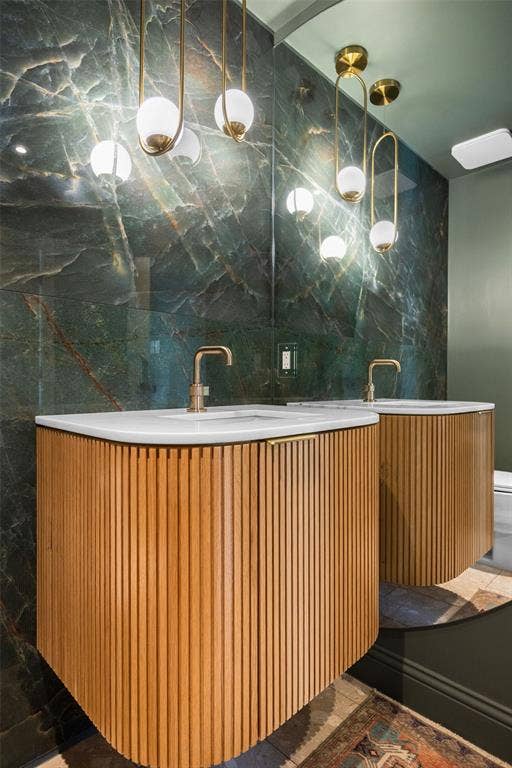 9863 Elmcrest Drive, Dallas, TX 75238 Powder bathroom with gorgeous designer finishes and lighting.