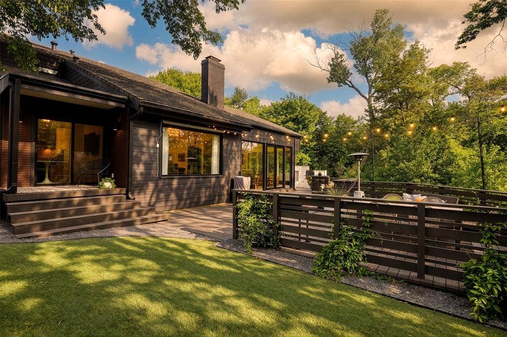 9863 Elmcrest Drive, Dallas, TX 75238 Exterior has turfed backyard, a multi-level outdoor living space, and gorgeous tree views.