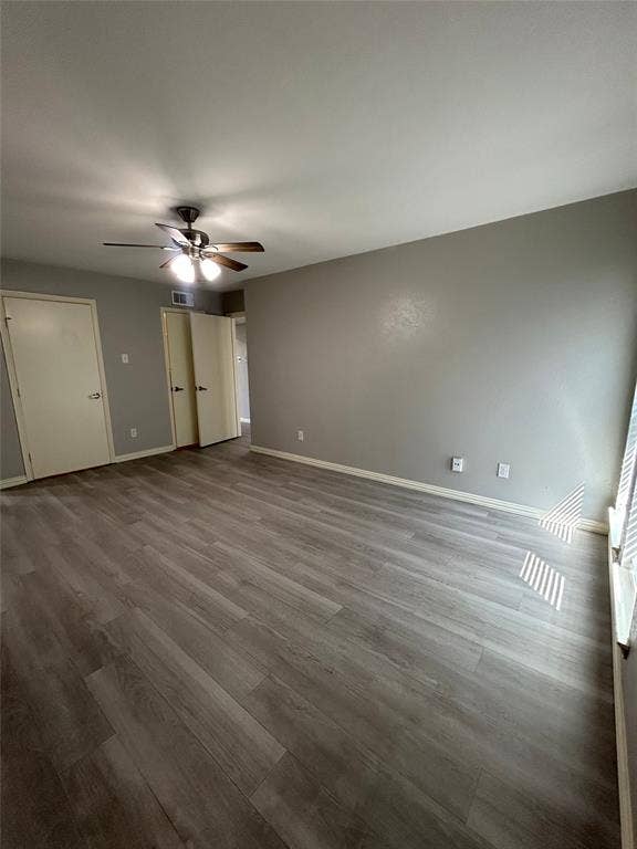 5826 Sandhurst Lane, #C, Dallas, TX 75206 Wood-finish plank flooring throughout, neutral painted walls, and a ceiling fan with integrated lighting