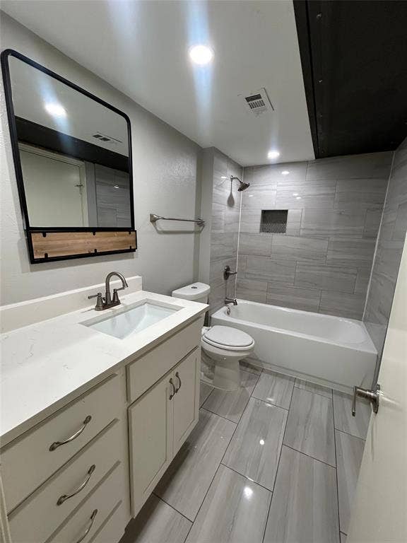 5826 Sandhurst Lane, #C, Dallas, TX 75206 Bathroom featuring a vanity with an integrated sink, a white countertop, and white cabinetry