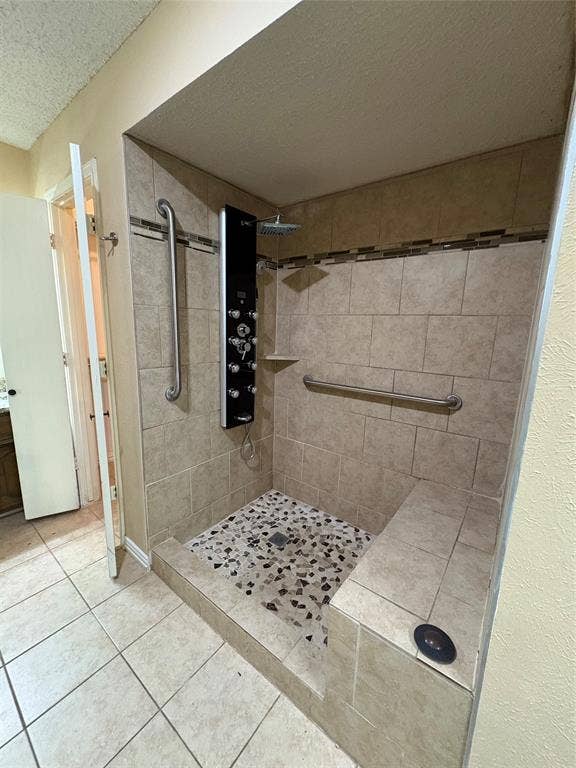 1025 Cloverdale Lane, DeSoto, TX 75115 Walk-in shower with tiled walls and floor