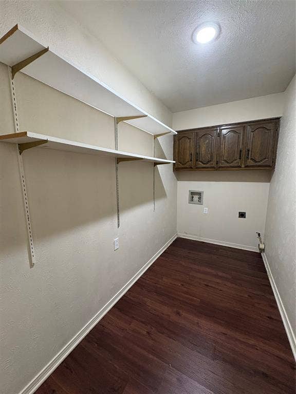 1025 Cloverdale Lane, DeSoto, TX 75115 Wood-finish flooring with built-in shelving, overhead cabinetry, and recessed lighting