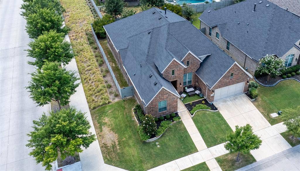 1101 10th Street, Argyle, TX 76226 Home includes 3 car tandem garage.