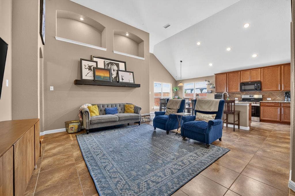 424 Foxcraft Drive, Fort Worth, TX 76131 Vaulted ceilings with recessed lighting, tile flooring, and integrated wall niches