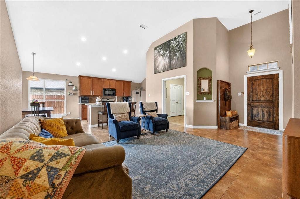 424 Foxcraft Drive, Fort Worth, TX 76131 Vaulted ceilings with recessed lighting, tile flooring, and a solid wood entry door