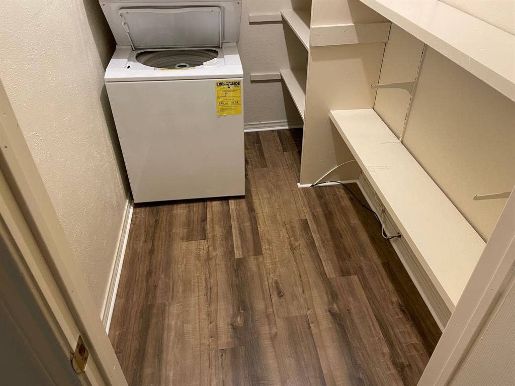 6050 Birchbrook Drive, #242, Dallas, TX 75206 Wood-finish flooring with built-in shelving