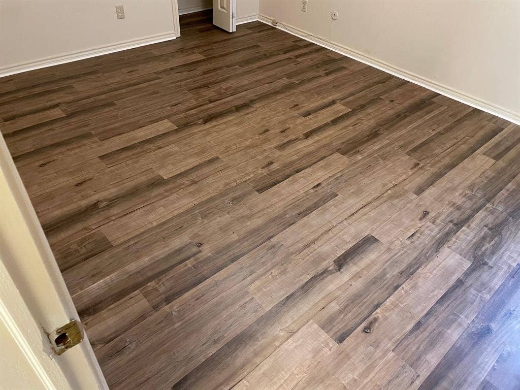 6050 Birchbrook Drive, #242, Dallas, TX 75206 Wood-finish flooring with varying plank widths