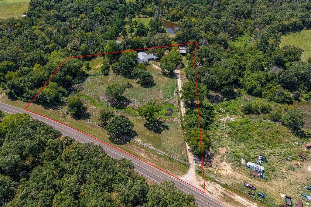 5250 Fm 2494, Athens, TX 75751 Expansive rural property featuring mature landscaping and established trees throughout the grounds