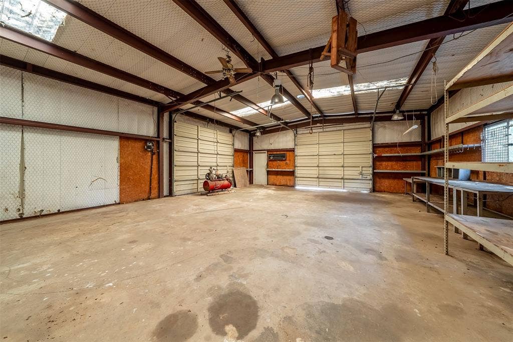 5250 Fm 2494, Athens, TX 75751 Expansive concrete flooring with exposed metal beam ceiling